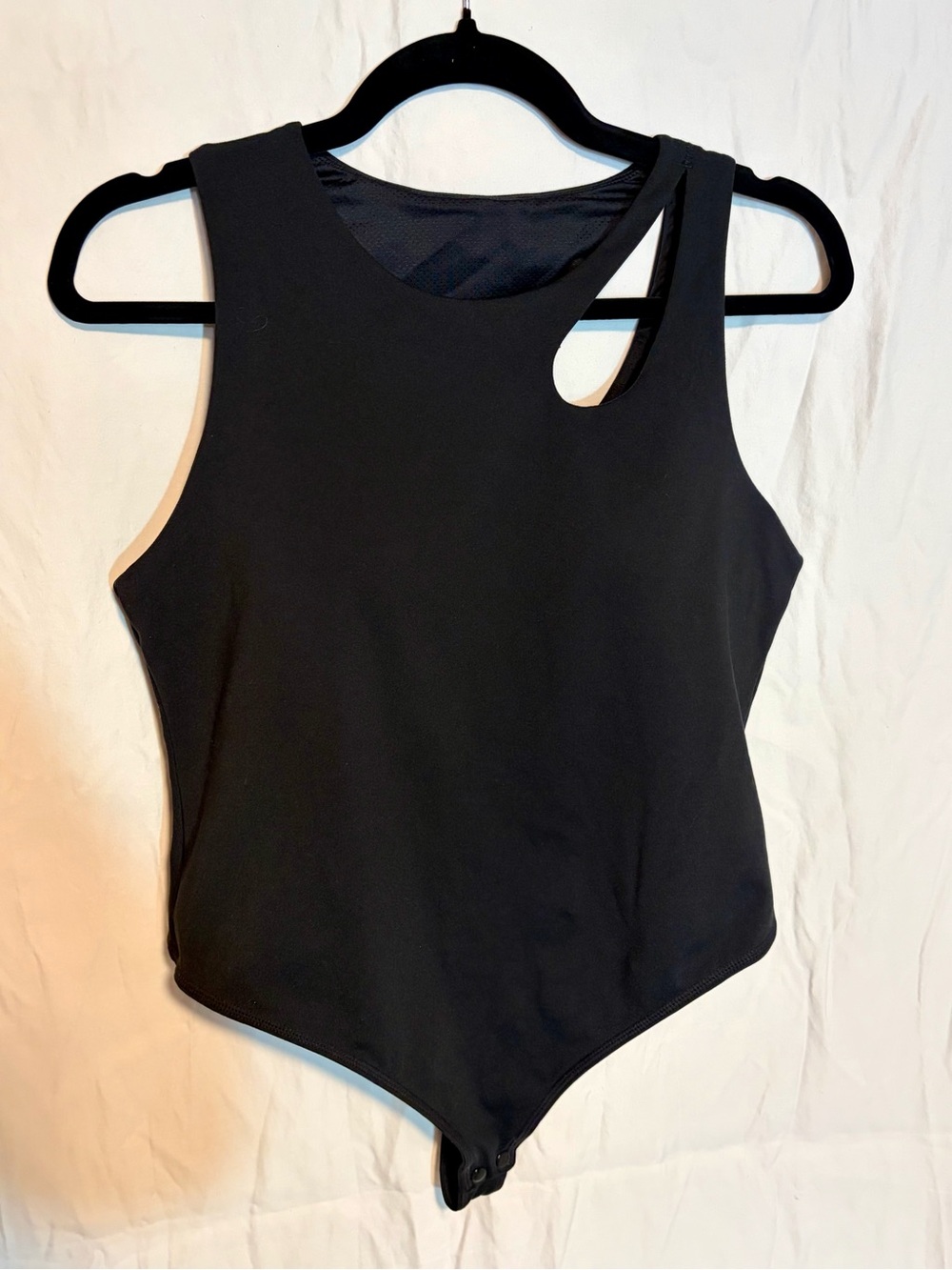 Senita Athletics Black Sleeveless Bodysuit with cutout